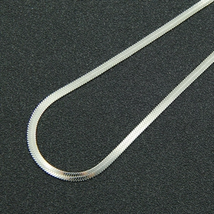 Detailed close-up of a silver snake chain necklace made of durable titanium steel