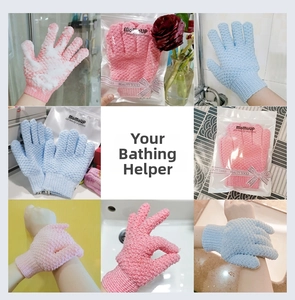 Detailed view of exfoliating shower gloves in pink and blue with elastic wrist band