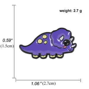 Detailed view of a purple triceratops enamel pin with 2.7cm width and 1.5cm height