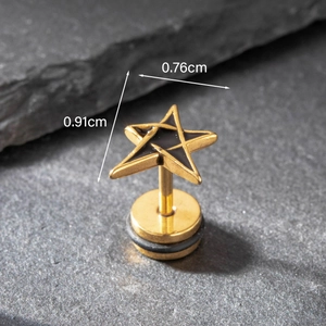 Detail of star piercing earring in black and gold finish with precise size measurements