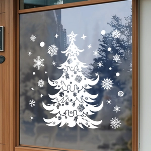 White Christmas tree window sticker with snowflakes and festive ornaments on glass