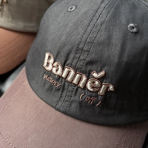 Macro shot of 3D letter embroidery and premium cotton twill texture on a baseball cap