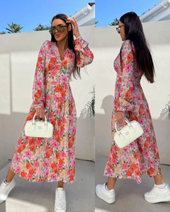 Detail view of pink floral long sleeve maxi dress with V-neckline and elastic waist
