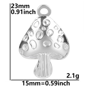 Detail view of silver mushroom pendant showing dimensions of 23mm height and 15mm width