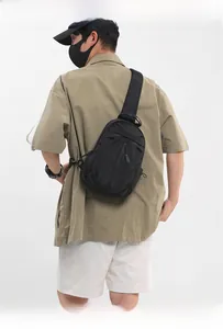 Close-up of durable black water-resistant oxford fabric and smooth zipper detail