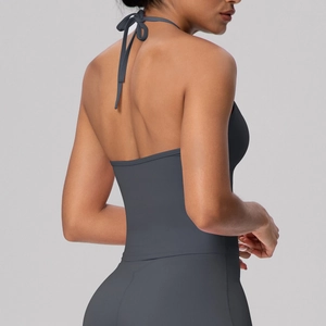 Detail of high-elastic backless yoga bra with adjustable halter ties in dark grey