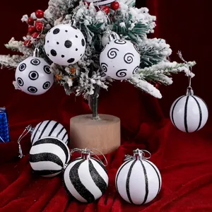 Christmas ball ornament set with black and white patterns on a festive red background