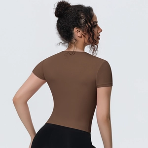 Back view of a slim fit brown yoga t-shirt for women in breathable quick-dry fabric