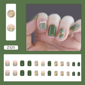 Vintage green press-on nails set with gold foil marbling and pearl accents for women