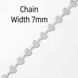 Detailed macro view of 7mm silver stainless steel heart-shaped DIY craft chain links