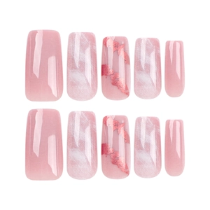 Pink and white marble press-on nails with gold foil accents in long ballerina shape