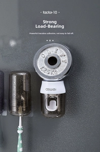 Wall-mounted automatic toothpaste dispenser showing high weight-bearing stability detail