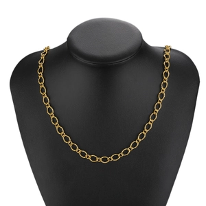 7mm wide gold plated stainless steel curb chain necklace displayed on a black bust