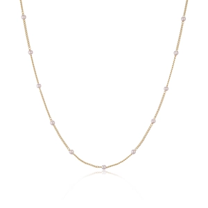 Minimalist gold plated necklace with small round pearls and circular cubic zirconia beads