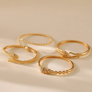 18K gold plated brass bracelets with snake and leopard motifs and zircon stones