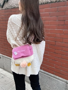 Cute lamb wool duck crossbody bag for girls featuring pink flap and plush pompom
