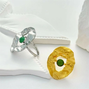 Elegant gold and silver irregular wave rings with green gemstone and open adjustable band