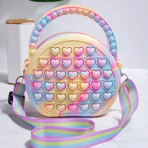 Colorful heart-shaped silicone pop-it shoulder bag for kids with rainbow strap