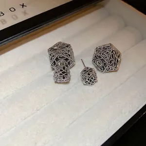 Vintage hollow geometric silver flower earrings with versatile two-way wear design