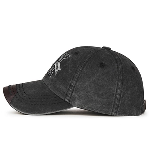 Vintage washed charcoal baseball cap with 3D letter embroidery and leather brim detail