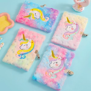 Detail of plush unicorn notebooks in pink, blue and purple with secure metal locks