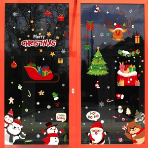 Christmas static window stickers featuring Santa Claus and reindeer on a glass door