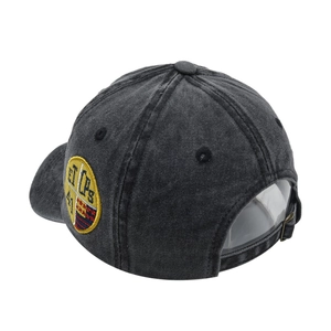 Detail view of washed cotton baseball cap with vintage patch and metal buckle strap
