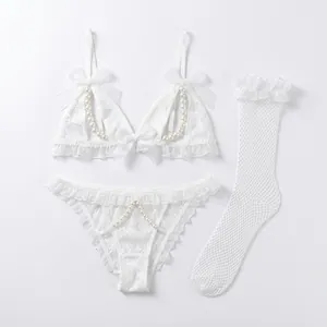 Three-piece sexy white lingerie set with pearl trim, mesh stockings and lace bows