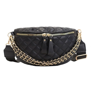 Classic black quilted waist bag with diamond stitching and golden chain detail on front