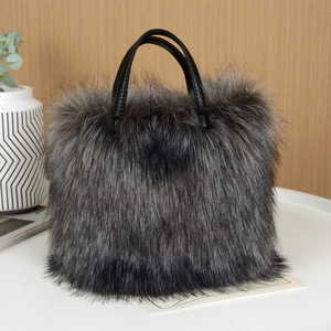 Borsa a mano in finta pelliccia grigia e nera con eleganti manici in pelle