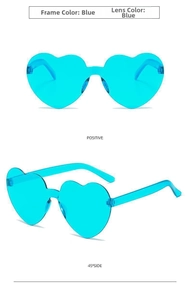 Close-up of heart-shaped rimless sunglasses in transparent teal with integrated lens