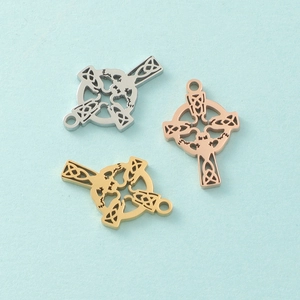 Three hollow Celtic knot cross pendants in silver, gold, and rose gold stainless steel