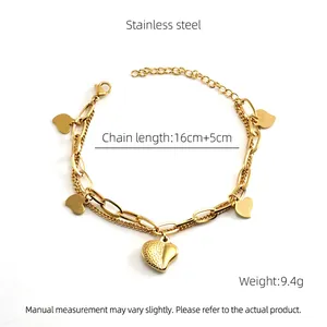 Detail of 18k gold-plated double-layer stainless steel bracelet with five heart charms