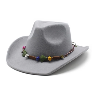 Detail of grey wool cowboy hat featuring a colorful stone beaded ethnic hatband
