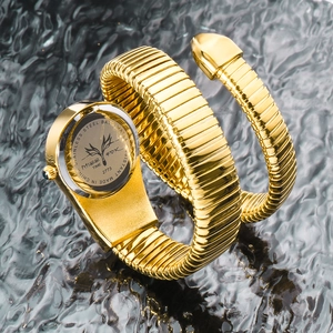 Detail of the stainless steel case back of the golden snake watch showing water resistance