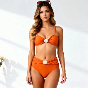 Orange bikini set with shell buckles, high waist bottoms and spaghetti strap top
