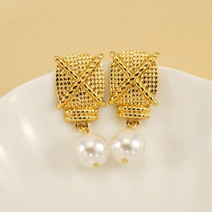 Vintage style 18K gold titanium steel earrings with woven texture and white pearl drops