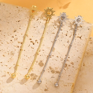 Detailed comparison of gold and silver sunburst star long chain drop earrings