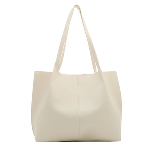 Minimalist cream white leather tote bag with vertical stitching and long shoulder straps