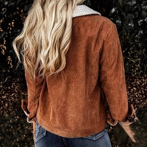 Back view of a caramel corduroy jacket featuring a cozy white sherpa lined collar