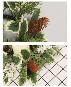 Detailed view of Christmas candle ring with pine cones and white frosted leaves