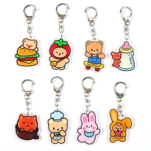 Cute acrylic animal keychains featuring bear and rabbit designs in a colorful grid layout