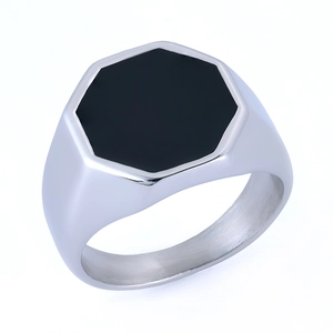 Macro shot of silver-tone stainless steel signet ring with black enamel square inlay