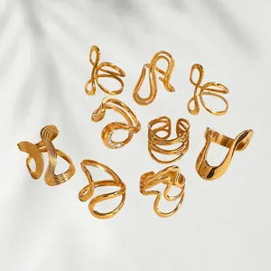 9-piece set of gold stainless steel chunky rings with geometric and wavy minimalist designs