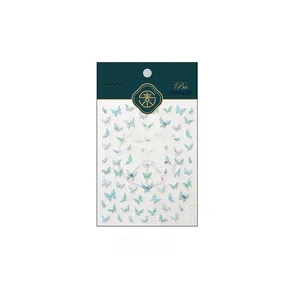 Detail view of TL-273 butterfly nail stickers with 3D rhinestones and gradient blue hues