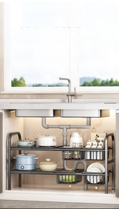 Adjustable kitchen under-sink rack with removable panels for drain pipe bypass
