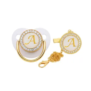 Luxury rhinestone baby pacifier set with gold letter A and matching clip chain