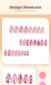 Detailed view of pink gradient almond nails with 3D heart gems and silver glitter accents