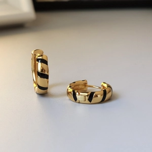 Minimalist S925 sterling silver hoop earrings with gold and black striped enamel finish