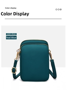 Lake blue waterproof nylon crossbody phone bag with double zipper and adjustable strap